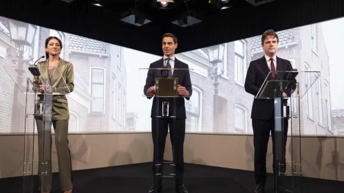 D66 leader Rob Jetten (center) Dilan Yeşilgöz and Christian Democratic Appeal head Henri Bontenbal present the coalition agreement of the Dutch government in The Hague, the Netherlands on Feb. 1, 2026. Photo by Aan de Slag.