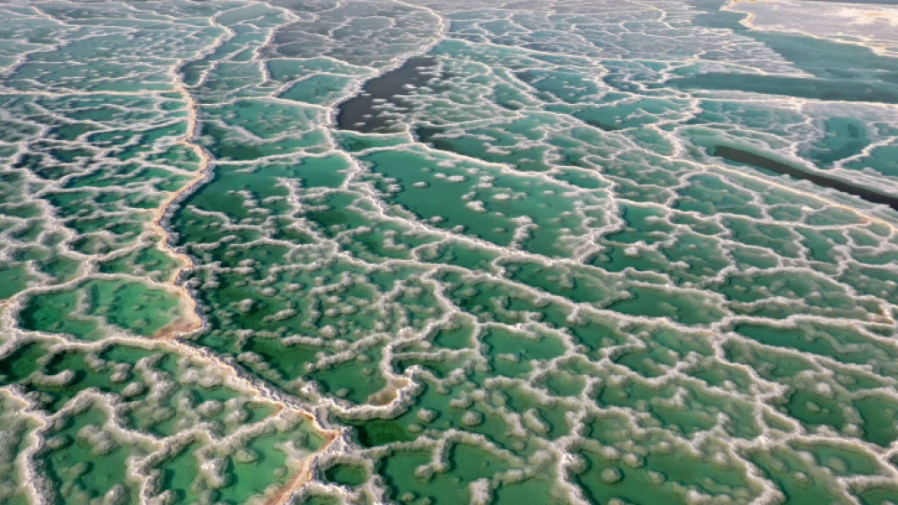 An aerial view shows the salt formations on the Dead Sea shore, July 20, 2020. Photo by Mendy Hechtman/Flash90.