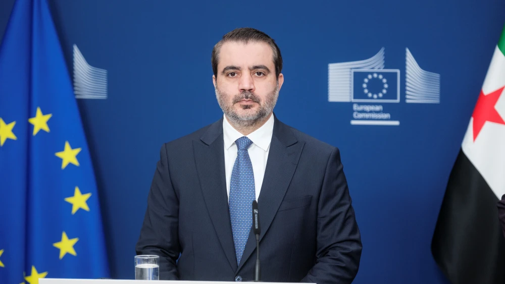 Syrian Foreign Minister Asaad al-Shaibani speaks to the media at the EU Commission headquarters on May 11, 2026, in Brussels, Belgium. Photo by Thierry Monasse/Getty Images.