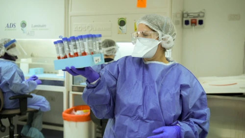 Technicians carry out a diagnostic test for coronavirus in a lab in Tel Aviv, on June 9, 2020. Photo by Yossi Zeliger/Flash90.