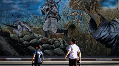 Palestinian children play with toy guns while celebrating the Eid al-Fitr holidays,in the West Bank city of Nablus, June 28, 2017. Photo by Nasser Ishtayeh/Flash90