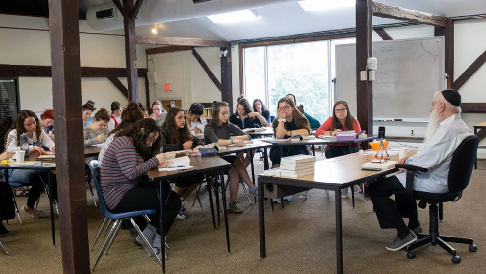 Participants in the three-week “UnCamp” learn with educator, lecturer and bestselling writer Rabbi Manis Friedman, dean of the Bais Chana Institute of Jewish Studies, July 2019. Credit: Courtesy.