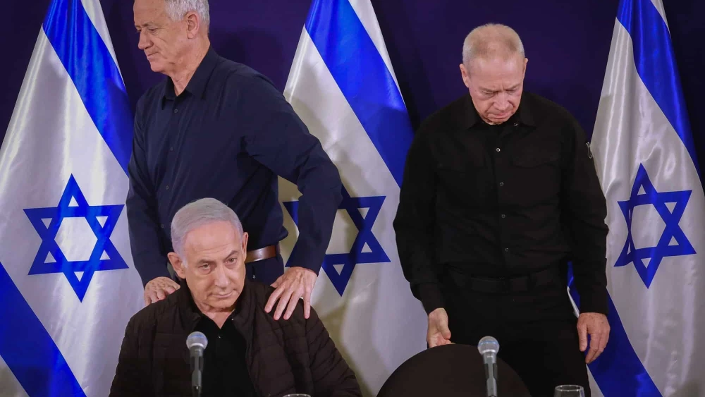 Prime Minister Benjamin Netanyahu, Defense Minister Yoav Gallant (left) and War Cabinet Minister Benny Gantz hold a press conference at the Defense Ministry in Tel Aviv, Nov. 11, 2023. Photo by Marc Israel Sellem/POOL.