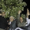 Palestinian Authority leader Mahmoud Abbas (second from left) waves with Palestinian prisoners released from Israeli jails during celebrations in Ramallah, Oct. 30, 2013. Photo by Issam Rimawi/Flash90.
