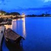 A traditional roofed wooden sampan, the main water transport in Kuching, Malaysia. Credit: Flickr/Wikimedia Commons.