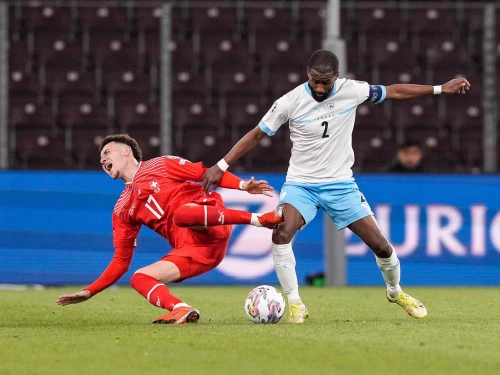Rubén Vargas of Switzerland (left) against Eli Dasa of Israel during a UEFA EURO 2024 qualifying round group I match at Stade de Genève on March 28, 2023. Photo by Jari Pestelacci/Eurasia Sport Images via Getty Images.