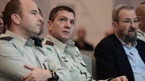IDF Intelligence Directorate head Maj. Gen. Aharon Haliva (center) attends a conference of the Gazit Institute in Tel Aviv alongside former Prime Minister Ehud Barak, Nov. 5, 2022. Photo by Tomer Neuberg/Flash90.