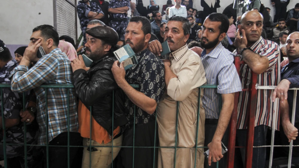 Palestinians wait at the Rafah border crossing with Egypt in the southern Gaza Strip, after it was opened for two days by Egyptian authorities, on May 11, 2016. Photo by Abed Rahim Khatib/Flash90.