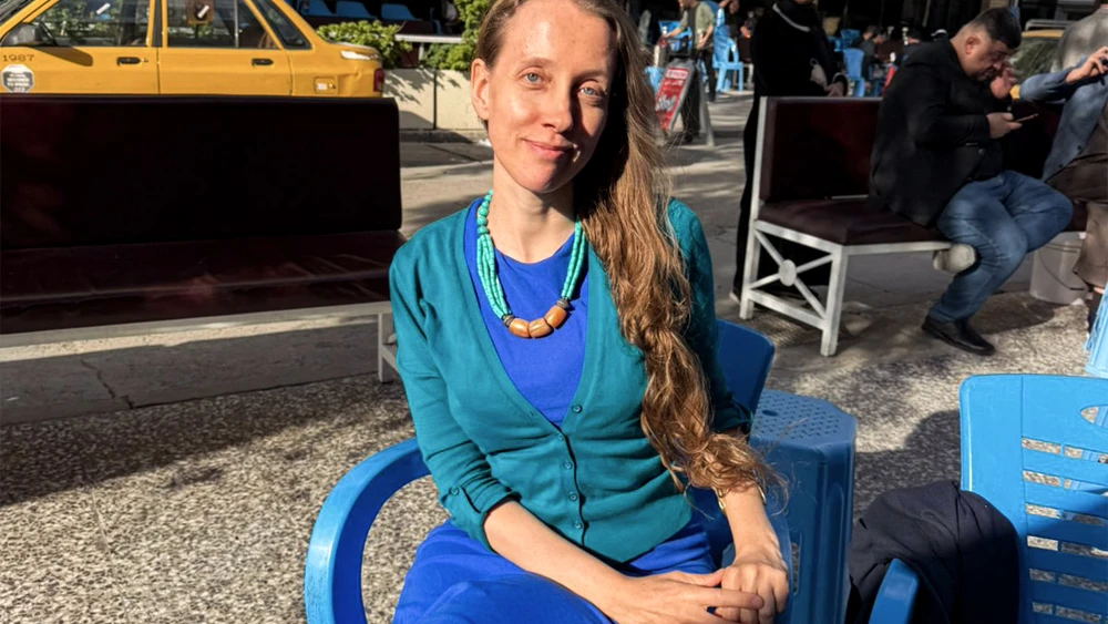 American journalist Shelly Kittleson poses for a picture in Baghdad on March 31, 2026. Photo by AFP via Getty Images.