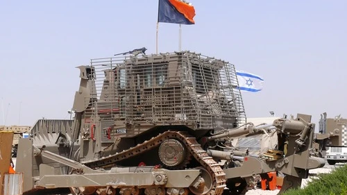 Click photo to download. Caption: An Israel Defense Forces bulldozer manufactured by Caterpillar, one of the companies the Protestant Church has pointed to in efforts to boycott Israel. Credit: MathKnight.