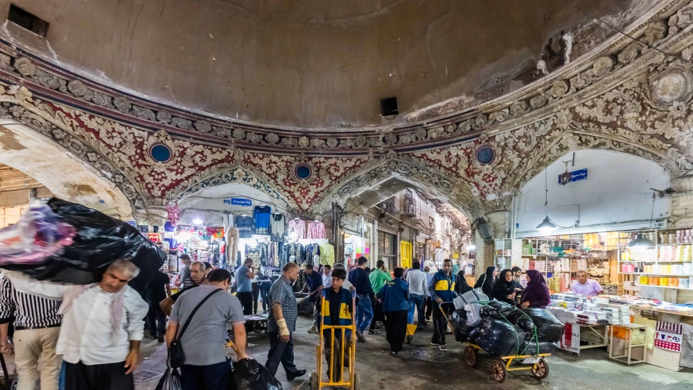 Shoppers browse the Grand Bazaar of Tehran on Sept. 17, 2016. Photo by Diego Delso via Wikimedia Commons.