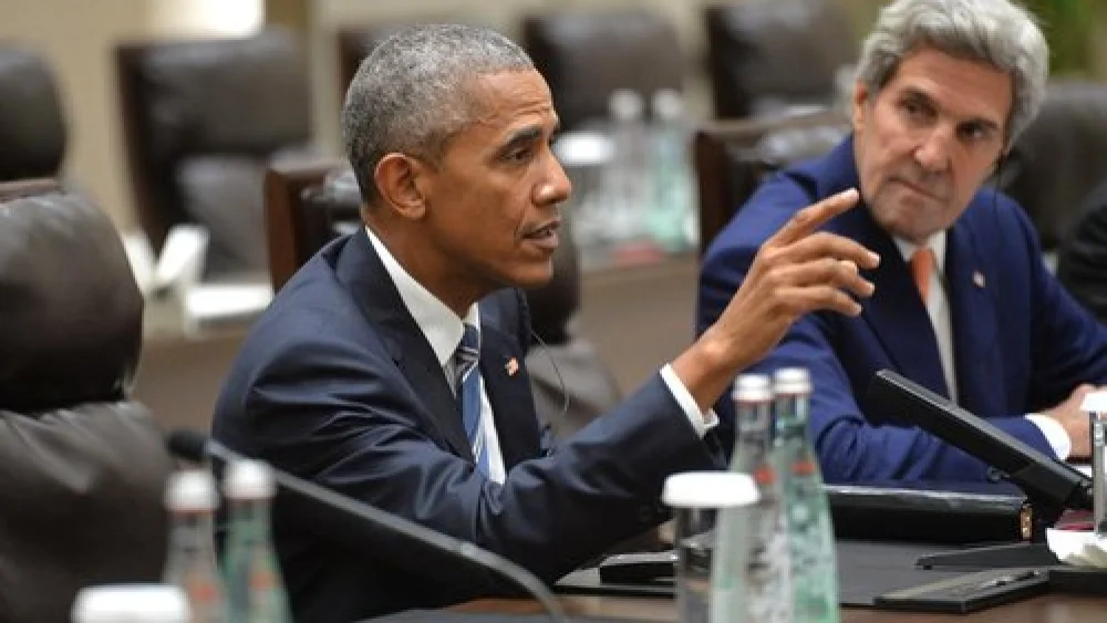 Former President Barack Obama (left) and former Secretary of State John Kerry. Credit: Kremlin.ru via Wikimedia Commons.