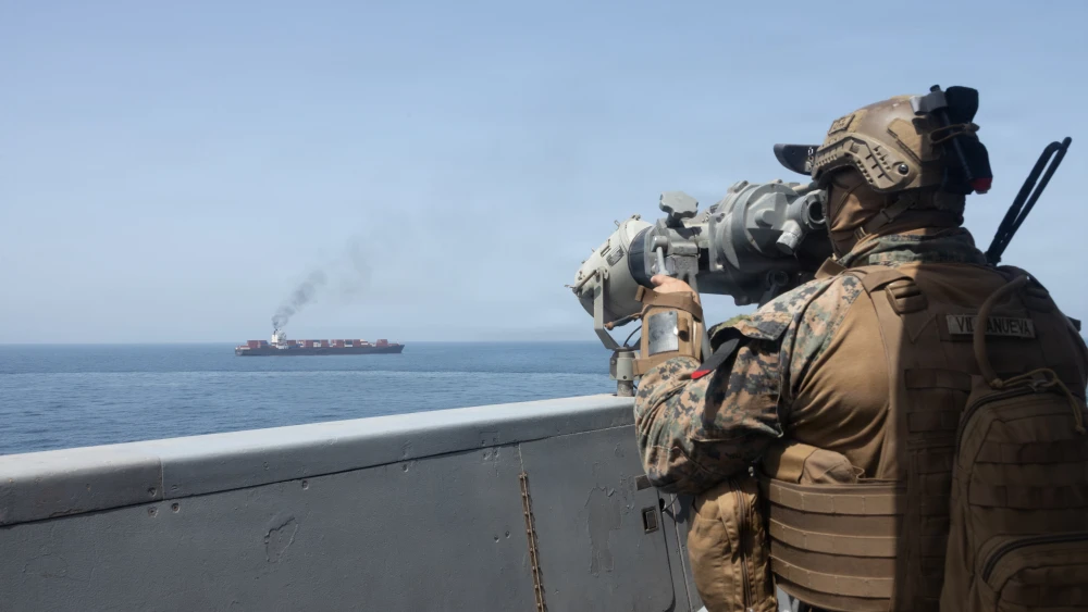 In this handout photo provided by U.S. Central Command, U.S. forces patrol the Arabian Sea near M/V Touska on April 20, 2026, after firing upon the Iranian-flagged vessel that the U.S. accused of attempting to violate the U.S. naval blockade of Iranian ports near the Strait of Hormuz. Photo by the U.S. Navy via Getty Images.