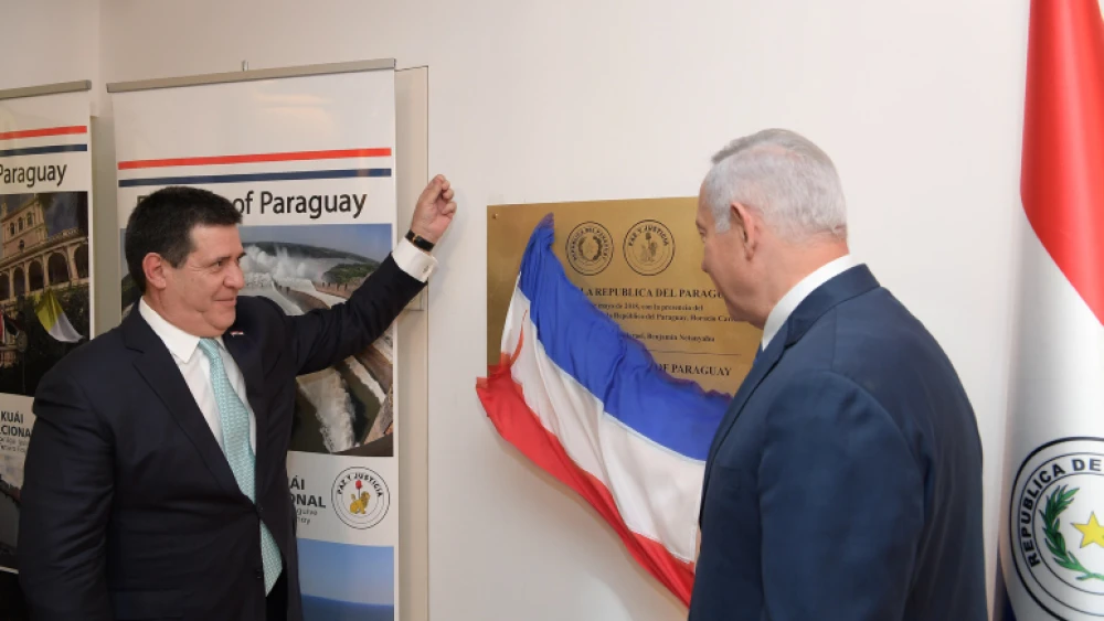 Israeli Prime Minister Benjamin Netanyahu and then-President of Paraguay Horacio Cartes at the opening ceremony for the South American nation's embassy in Jerusalem, May 21, 2018. Photo by Amos Ben Gershom/GPO.
