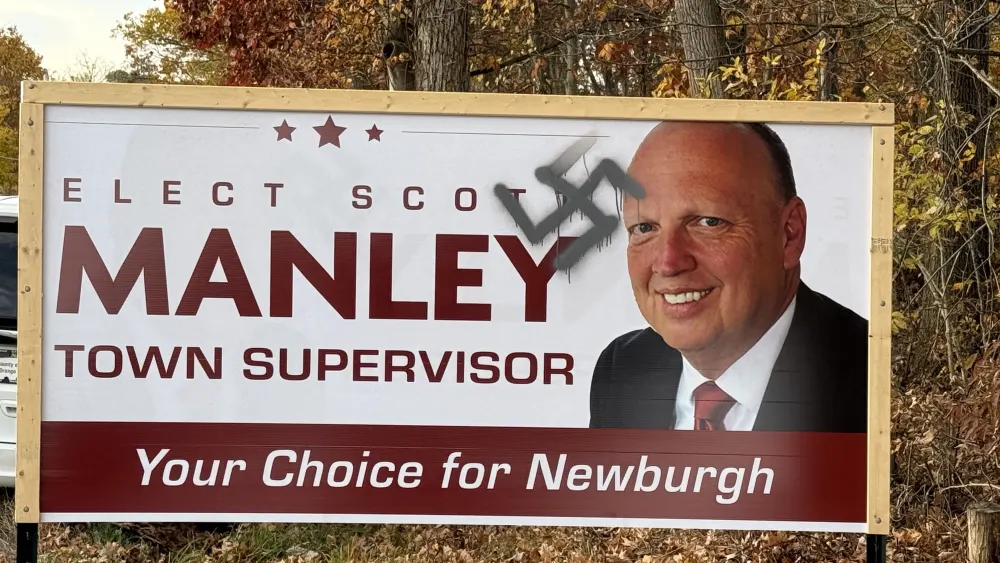 A swastika spray-painted on a campaign sign for Scott Manley, a Jewish Republican running for town supervisor, in Newburgh, N.Y., Oct. 28, 2026. Credit: Courtesy of Scott Manley.