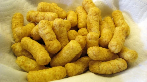 Bamba, the popular Israeli snack composed of puffed cornmeal and flavored like peanut butter. They also come in strawberry. Credit: Nsaum75/Wikimedia Commons.