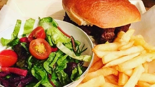Eliana Rudee's Passover fare in Israel, including a hamburger on a potato-bread bun. Credit: Eliana Rudee.
