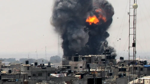 Smoke and fire rise from a location reportedly belonging to Hamas, following an Israeli airstrike in the southern Gaza town of Rafah on July 14, 2018. Photo by Abed Rahim Khatib/Flash90.