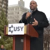Click photo to download. Caption: Pastor Corey Brooks of the New Beginnings Church of Chicago speaks at the Dec. 26 “Praying With Our Feet” rally against gun violence organized by United Synagogue Youth (USY). Credit: USY.