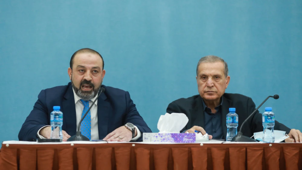 P.A. Attorney General Akram Al Khateeb (left) and the spokesperson for the P.A. Presidency, Nabil Abu Rudeineh, present the results of an investigation into the death of Al Jazeera journalist Shireen Abu Akleh, in Ramallah, May 26, 2022. Photo by Flash90.