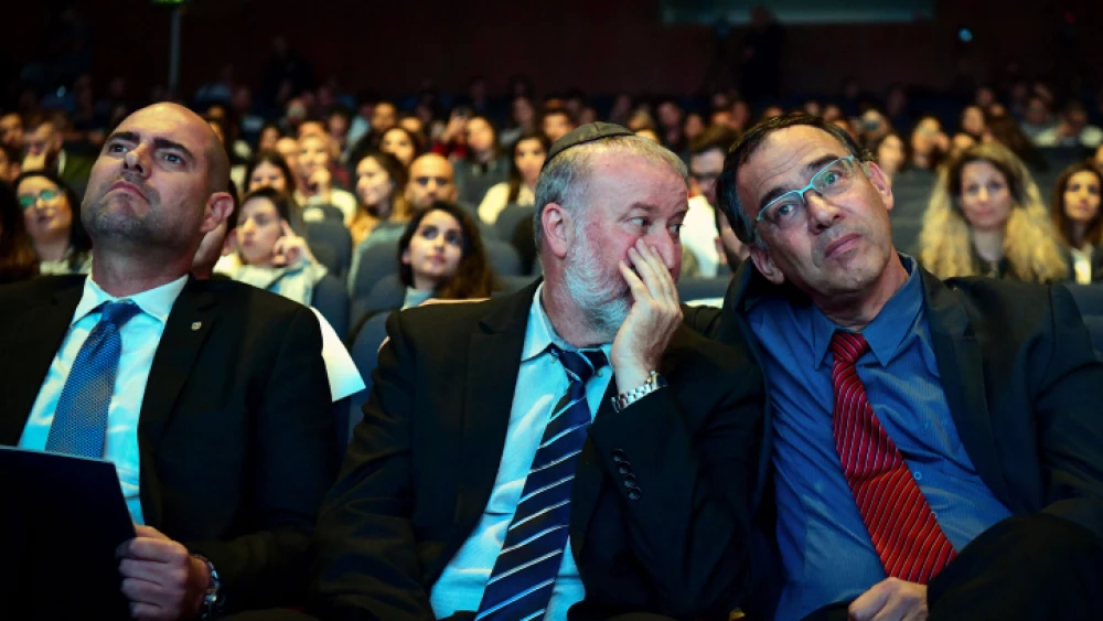 Israeli Attorney General Avichai Mandelblit (center), Justice Minister Amir Ochana (left) and State Prosecutor Shai Nitzan attend a conference in Tel Aviv on Nov. 4, 2019. Photo by Flash90.