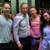 Rabbi Jonathan Feldman (second from left), who heads Tribe Tel Aviv, with attendees at a nighttime social event, including Steve Reich (to his right). Credit: Courtesy.