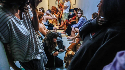 Israelis take cover inside a bomb shelter as a rocket alert is activated in Tel Aviv, Oct. 22, 2024. Photo by Yehoshua Yosef/Flash90.