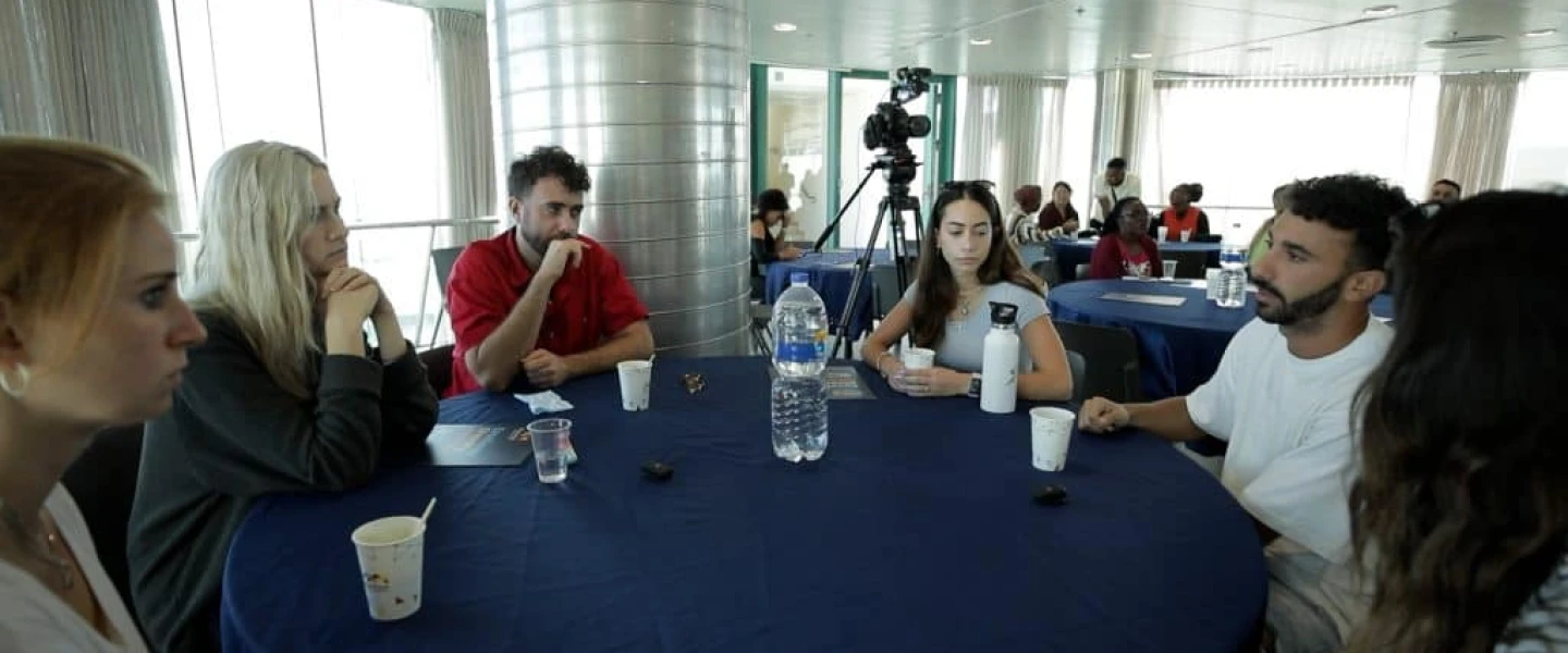 Survivors of Hamas's Oct. 7 music festival massacre meet with students from the University of Haifa International School, Nov. 6, 2023. Credit: University of Haifa.