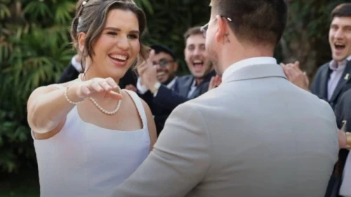 The marriage ceremony for Michelle Rukovicin and her partner, Rinat Kasimov, in Israel on Sept. 30, 2025. Source: @raz_sauber_/X.