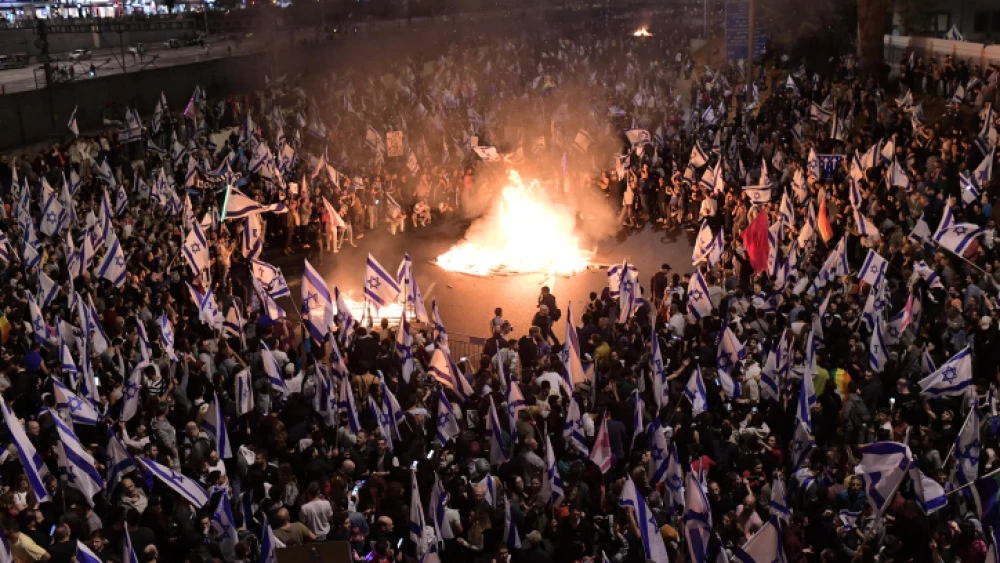 Israelis block the Ayalon Highway in Tel Aviv during a protest against the Israeli government's planned judicial overhaul on March 26, 2023. Photo by Tomer Neuberg/Flash90.