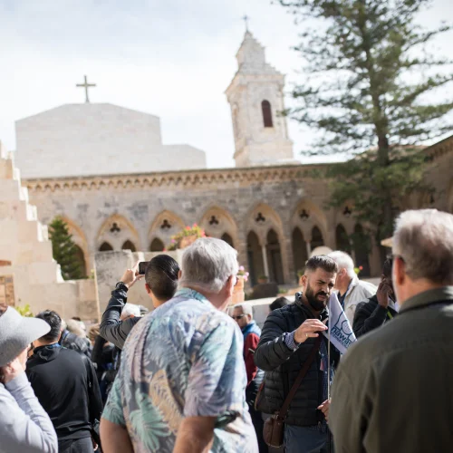 Tourists visit the Church of the Pater Noster, a Roman Catholic Church located on the Mount of Olives in Jerusalem, on Dec. 3, 2018. It is part of a Carmelite monastery, also known as the Sanctuary of the Eleona. Photo by Hadas Parush/Flash90.