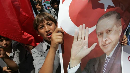 In Gaza City on Sept. 13, 2011, Palestinian students hold up pictures of then Turkish prime minister and now President Recep Tayyip Erdoğan during a rally that urged Erdogan to visit the Hamas-ruled Gaza Strip. Erdogan's pro-Palestinian and anti-Israel views have been increasingly on display in recent years. Credit: Abed Rahim Khatib/Flash 90.