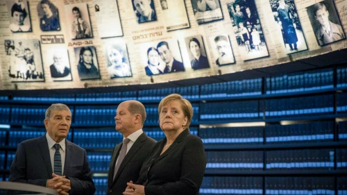 German Chancellor Angela Merkel at the Hall of Names during her visit at the Yad Vashem Holocaust memorial in Jerusalem on Oct. 4, 2018. Credit: Oren Ben Hakoon/POOL.