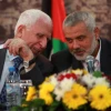 File photo: Head of the Hamas government Ismail Haniyeh (right) and senior Fatah official Azzam Al-Ahmed at a news conference in Gaza City. Credit: Abed Rahim Khatib/Flash90.
