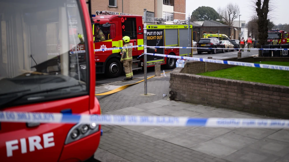 Fire services monitor the scene after four Hatzola ambulances were set on fire overnight next to Machzike Hadath Synagogue in London, the U.K. on March 23, 2026 . Photo by Leon Neal/Getty Images.