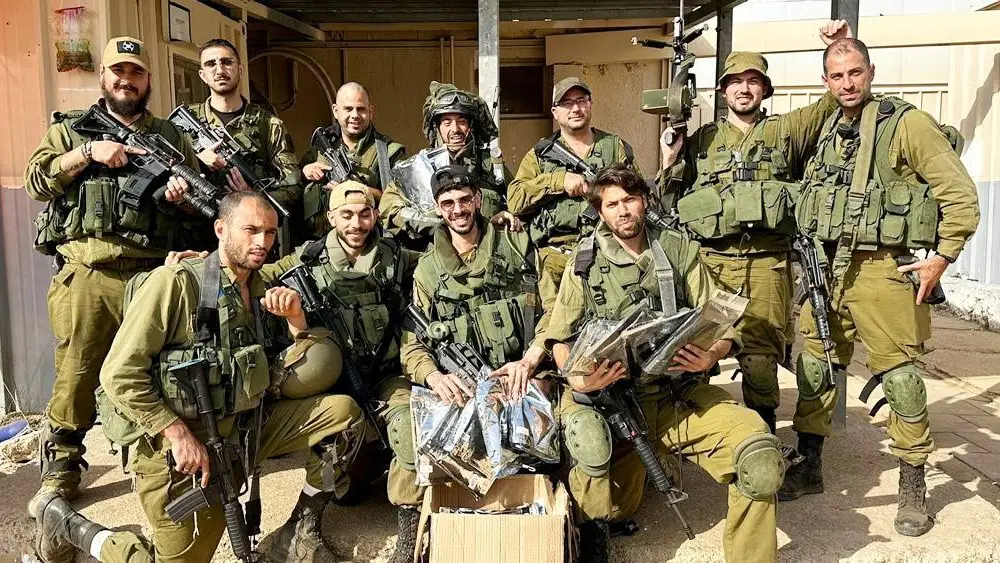 IDF soldiers receive protective equipment from One People, a civilian group that formed shortly after Hamas's Oct. 7 attack on Israel. Photo courtesy of One People.