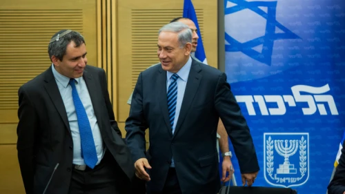 Israeli Prime Minister Benjamin Netanyahu speaks with Immigrant Absorption Minister Ze'ev Elkin during a Likud Party meeting at the Knesset, on May 18, 2015. Photo by Yonatan Sindel/Flash90.