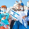 Children from France arrive in Israel as part of a group aliyah flight, July 21, 2021. Photo by Noga Malsa.
