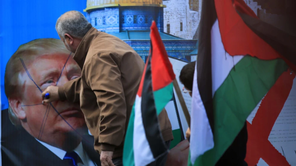 Palestinian demonstrators in Gaza City take part in a protest march against the U.S. “Peace to Prosperity” plan, Feb. 21, 2020. Photo by Ali Ahmed/Flash90.