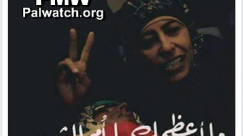 In this photo published in January 2016 on the Palestinian Fatah faction's Facebook page, the mother of late Palestinian terrorist Muhammed Shamasneh makes a “V” sign with her right hand. The caption reads, “How great you are, O mother of the Martyr.” Credit: Palestinian Media Watch.