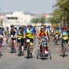 Adults and kids participate in the “Wheels of Love” annual bike race in Israel. Credit: Tomer Feder Sport Photography.