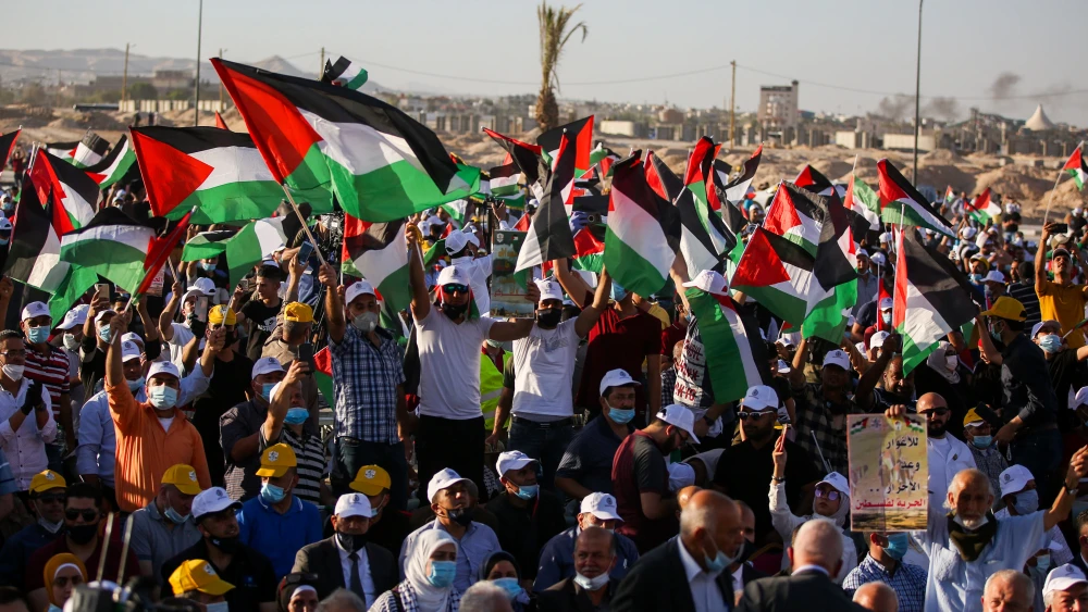 Thousands of Palestinians attend a rally in Jericho against Israel's plan to extend sovereignty over parts of Judea and Samaria, on June 22, 2020. Photo by Flash90.