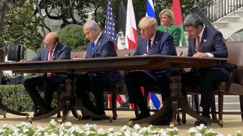 From left: Bahraini Foreign Minister Abdullatif bin Rashid Al Zayani, Israeli Prime Minister Benjamin Netanyahu, U.S. President Donald Trump, Emirati Foreign Minister Abdullah bin Zayed Al Nahyan hold up the Abraham Accords signed at the White House as the UAE and Bahrain normalize ties with Israel, Sept. 15, 2020. Source: Dan Scavino via Twitter.