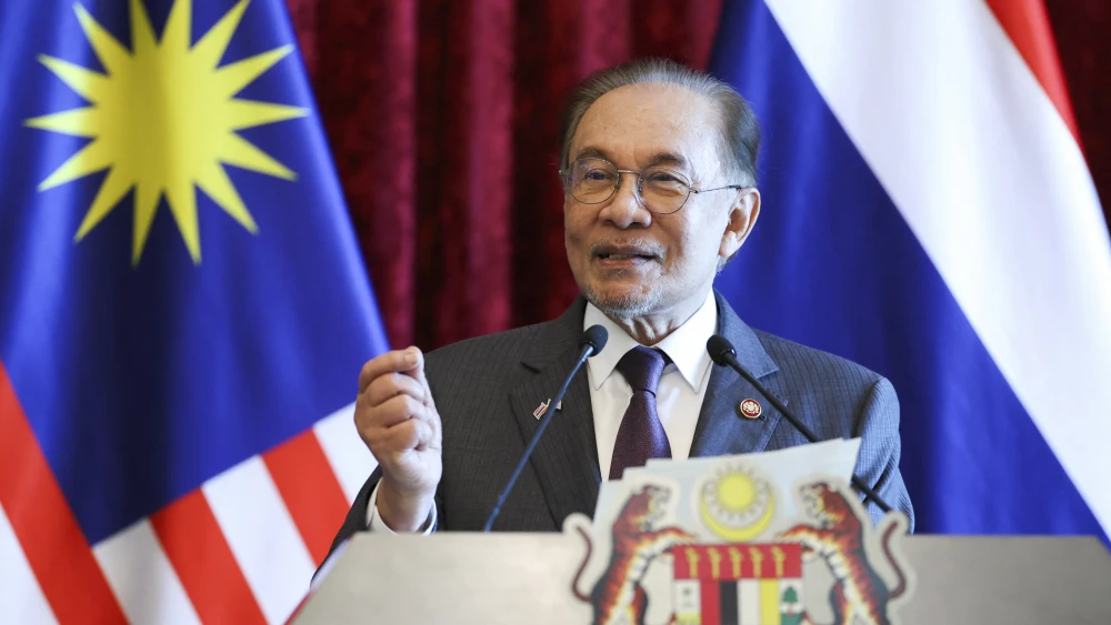Malaysian Prime Minister Anwar Ibrahim speaks during a press conference with Thai Prime Minister Anutin Charnvirakul, July 9, 2026. Photo by Hasnoor Hussain/POOL/AFP via Getty Images.