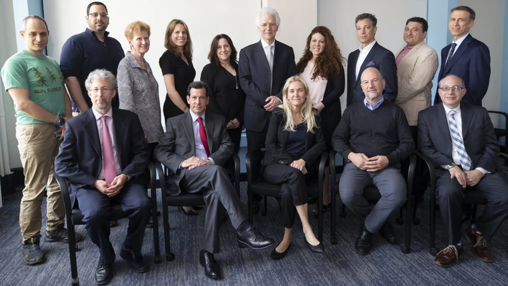 James Gertler, trustee of the Zuckerman Institute, and Richard Lester, associate provost for international activities at MIT, join with representatives from the seven American affiliates of Israeli universities as part of a new STEM partnership. Credit: Credit: The Zuckerman Institute.