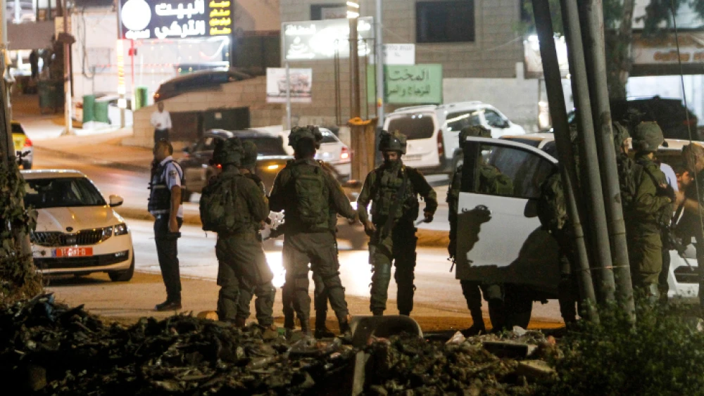 Security personnel secure the scene where Israeli soldiers shot a suspect in a vehicular attack, in Huwara, near Nablus, Sept. 22, 2022. Credit: Nasser Ishtayeh/Flash90