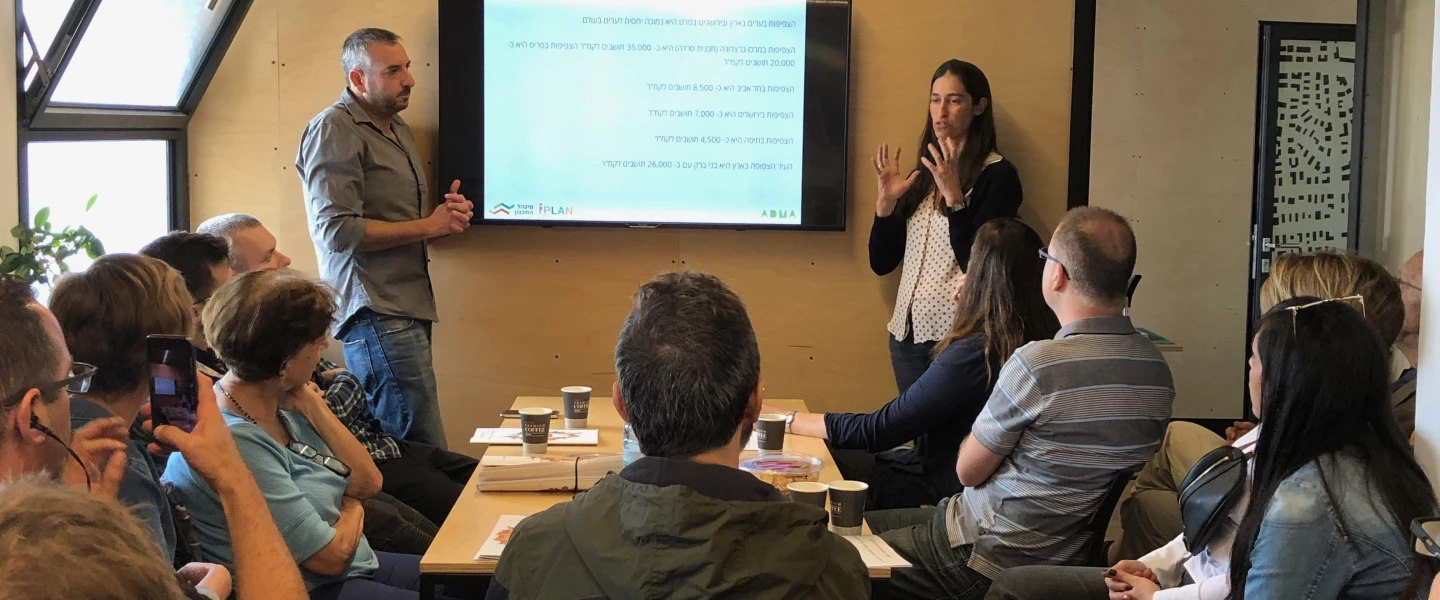 ADMA co-founders Amos Darr (left) and right Moran Amikam presenting at the open house at the ADMA Architecture Studio in the Clal Center in Jerusalem on Nov. 1, 2019. Credit: ADMA.