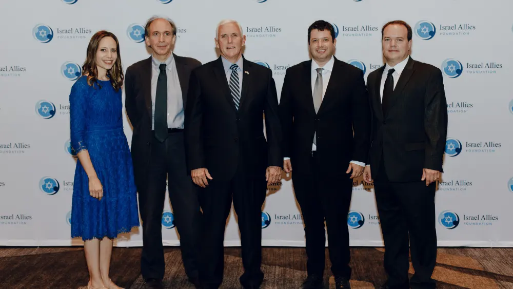 Israel Allies Foundation staff with Gilad Erdan and Mike Pence. Credit: Israel Allies Foundation.