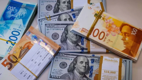 Illustration of American 100 dollar bills, 100 and 200 shekel bills and 50 euro bills, May 19, 2025. Photo by Nati Shohat/Flash90.