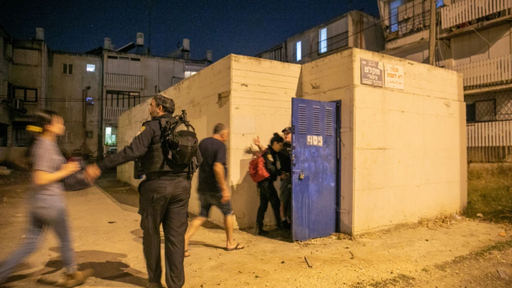 Israelis in Bomb Shelter